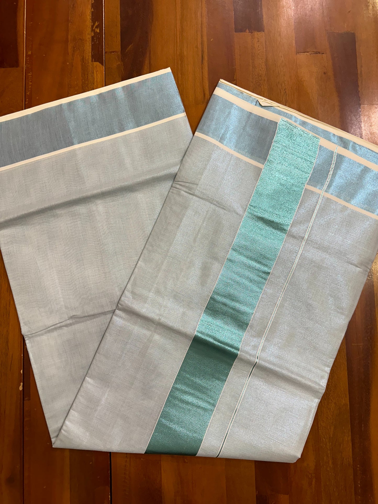 Southloom Turquoise Kasavu Tissue Plain Kerala Saree