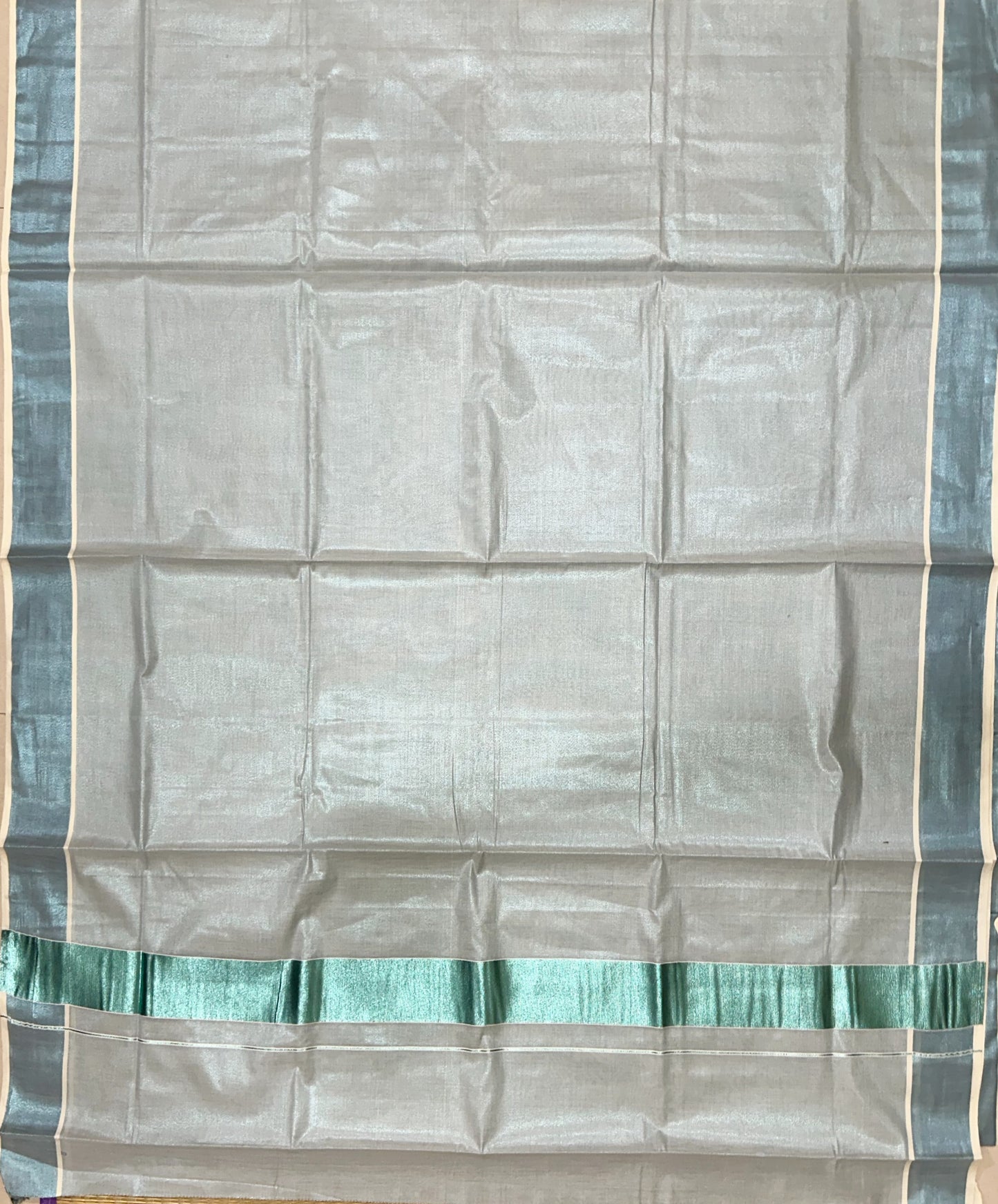 Southloom Turquoise Kasavu Tissue Plain Kerala Saree