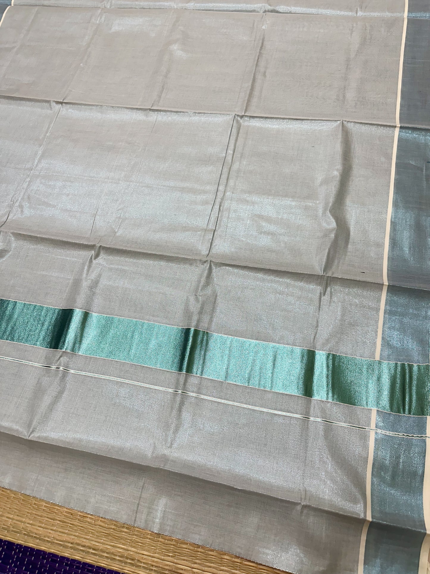 Southloom Turquoise Kasavu Tissue Plain Kerala Saree