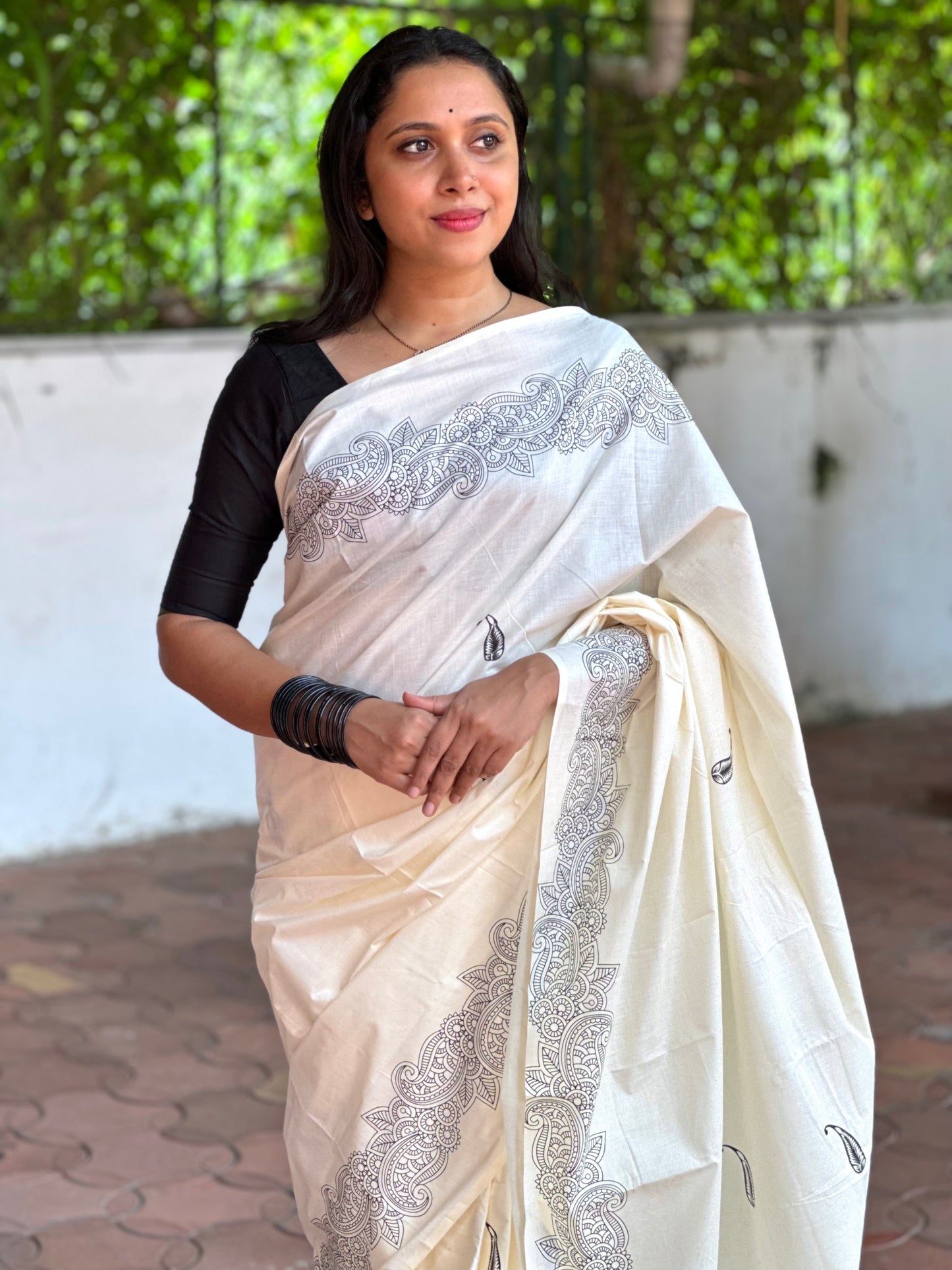 Southloom Onam Exclusive Kerala Saree with Classy Black Minimalistic Border and Paisley on Body