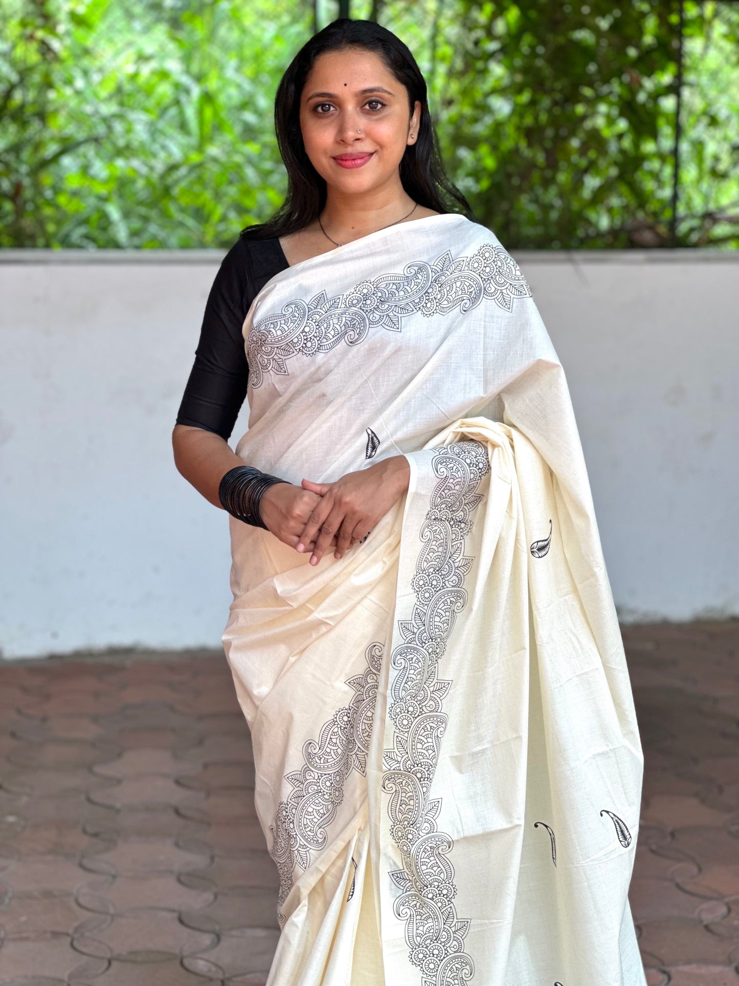 Southloom Onam Exclusive Kerala Saree with Classy Black Minimalistic Border and Paisley on Body