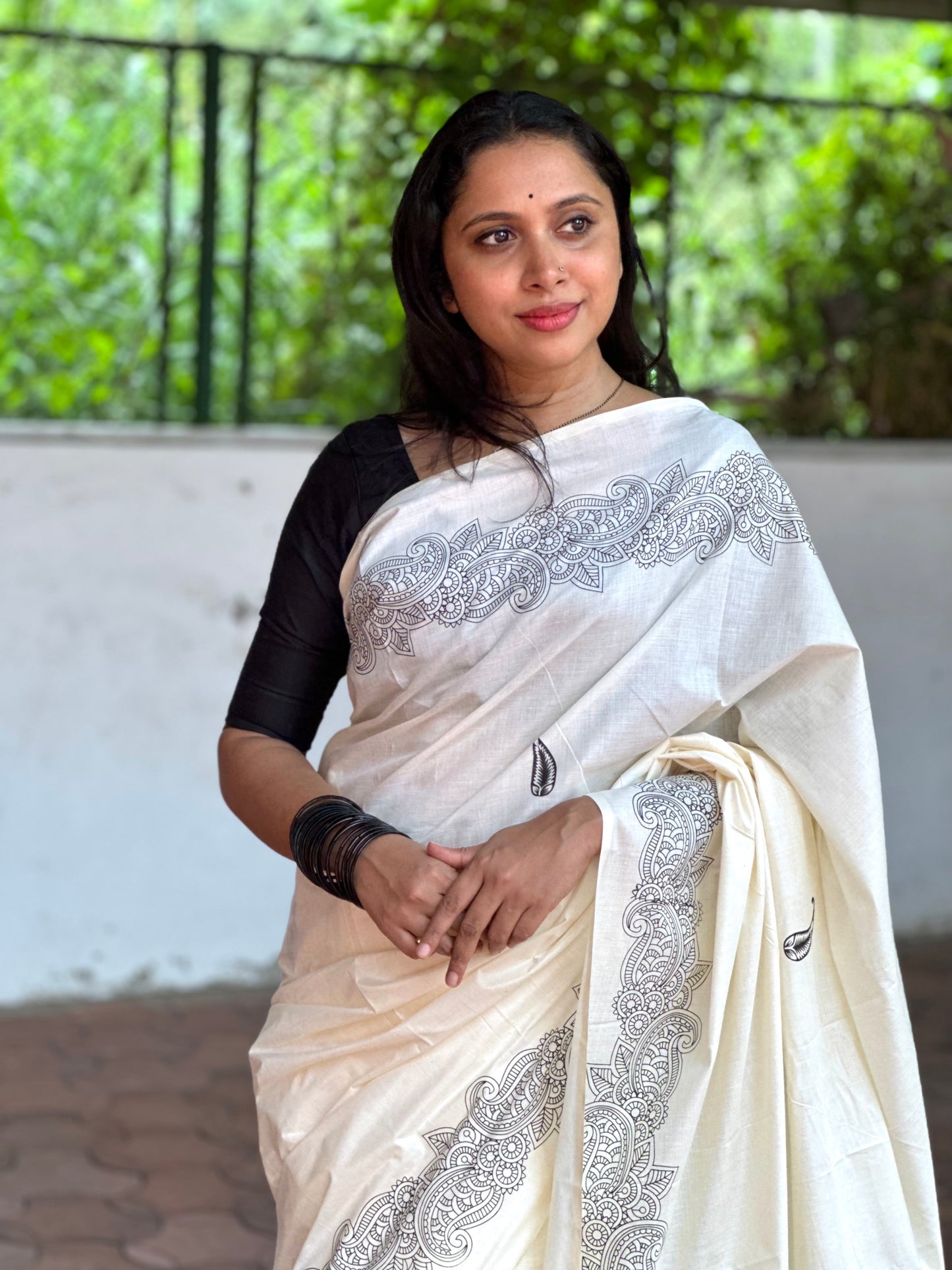 Southloom Onam Exclusive Kerala Saree with Classy Black Minimalistic Border and Paisley on Body