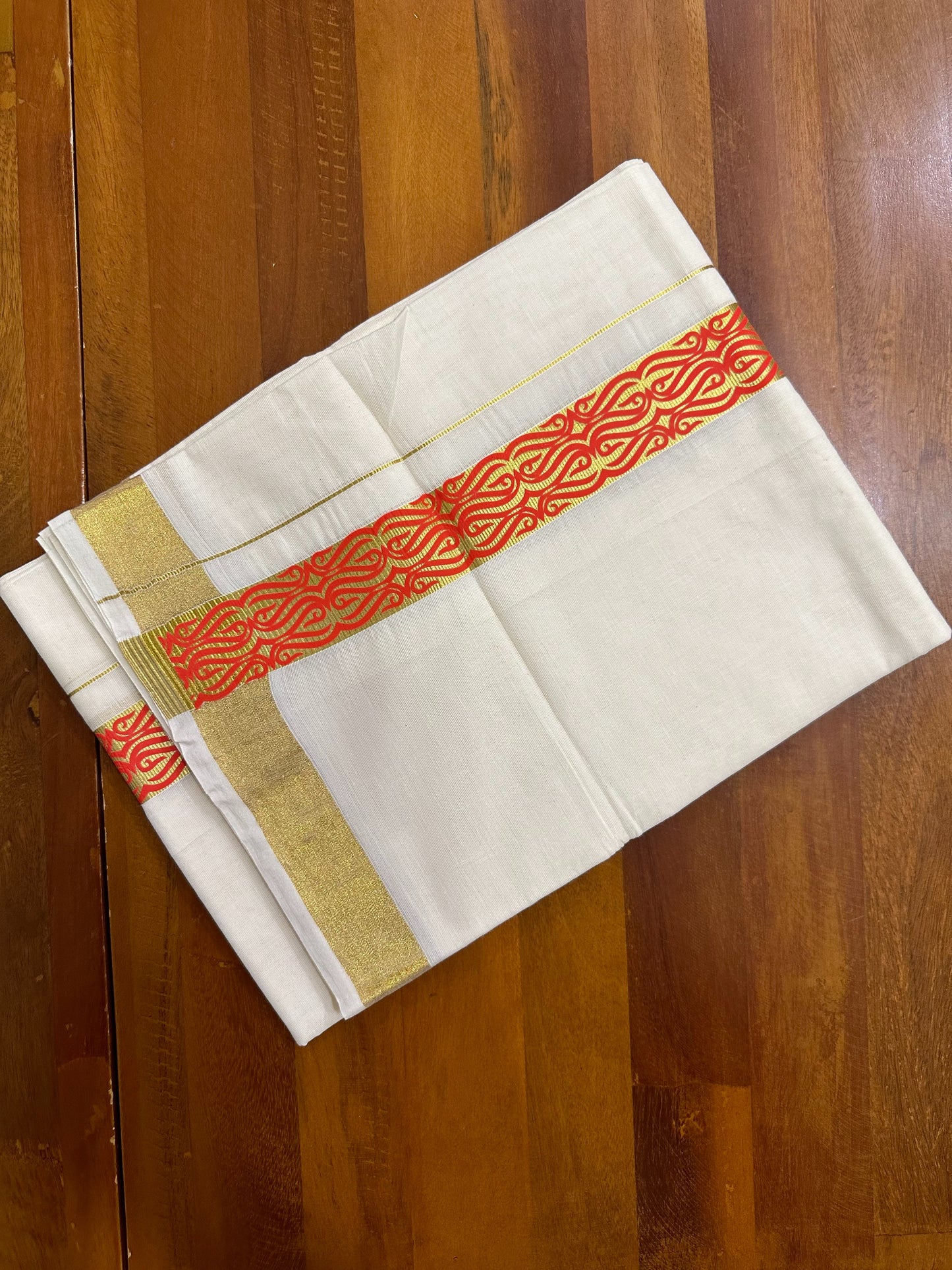 Southloom Kasavu Double Mundu with Orange Along Kasavu Kara