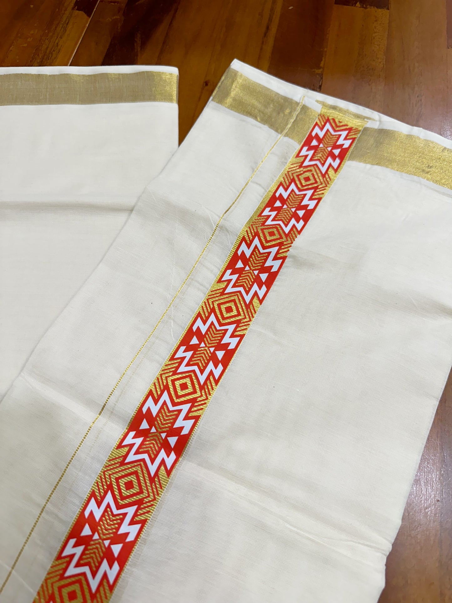 Southloom Kasavu Double Mundu with Orange Tribal / Retro Prints on Kara