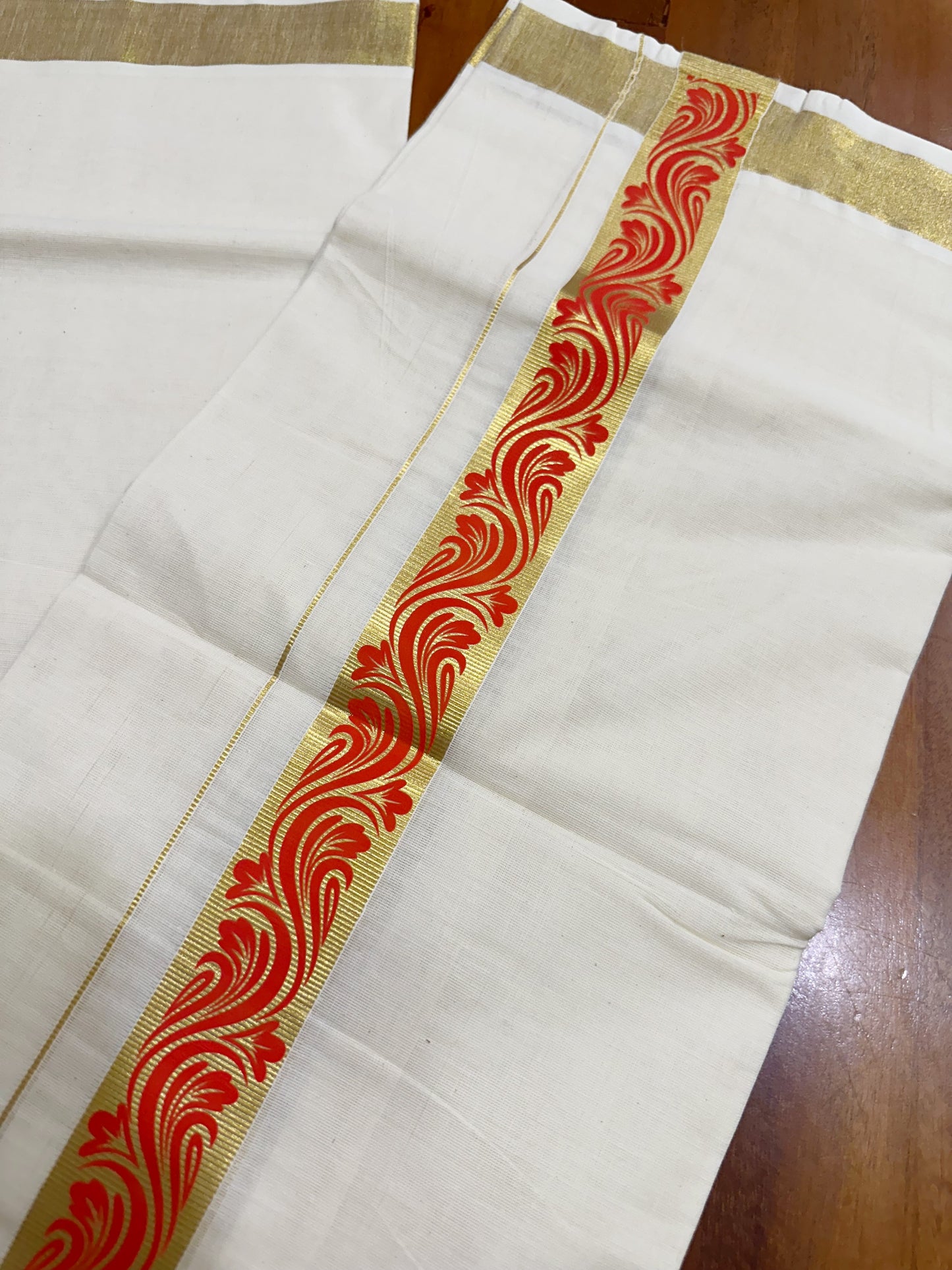 Southloom Kasavu Double Mundu with Orange Tribal / Retro Prints on Kara