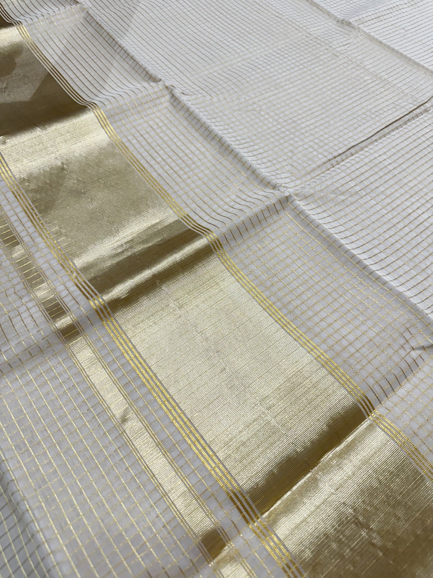 Southloom Balaramapuram Unakkupaavu Handloom Kasavu Saree with Checks Across the Body In Silver and Gold Mixed Kasavu Shade