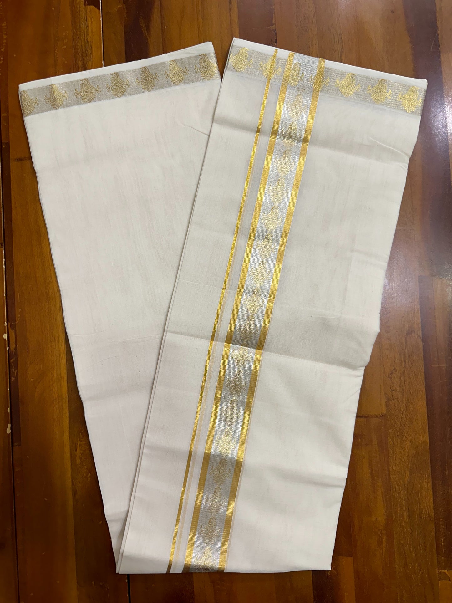 Southloom Balaramapuram Unakkupaavu Handloom Gold and Silver Kasavu Mundu with Woven Work in Kara and Border