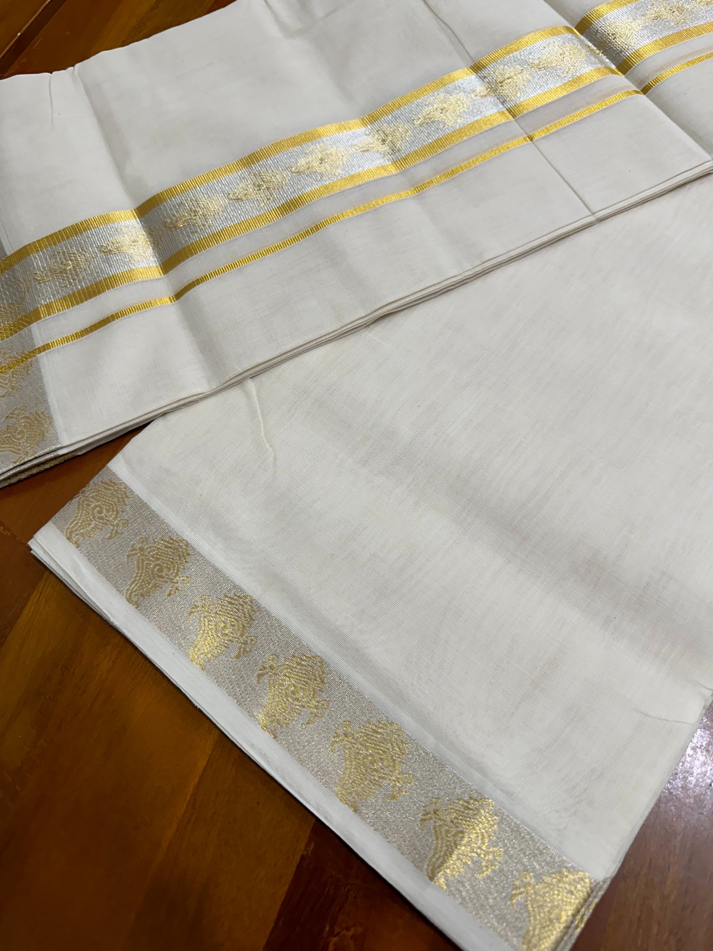 Southloom Balaramapuram Unakkupaavu Handloom Gold and Silver Kasavu Mundu with Woven Work in Kara and Border