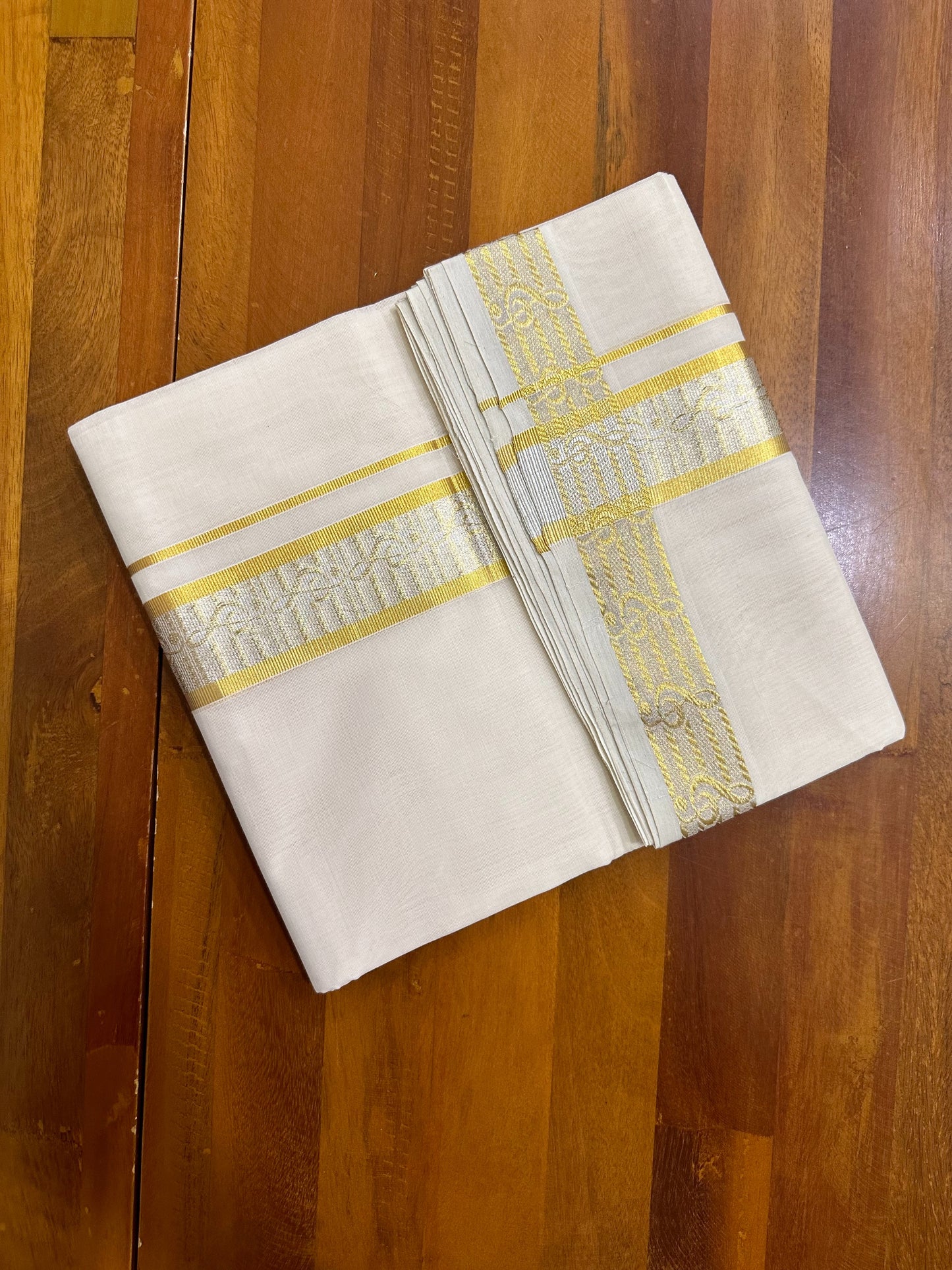 Southloom Balaramapuram Unakkupaavu Handloom Gold and Silver Kasavu Mundu with Woven Work in Kara and Border