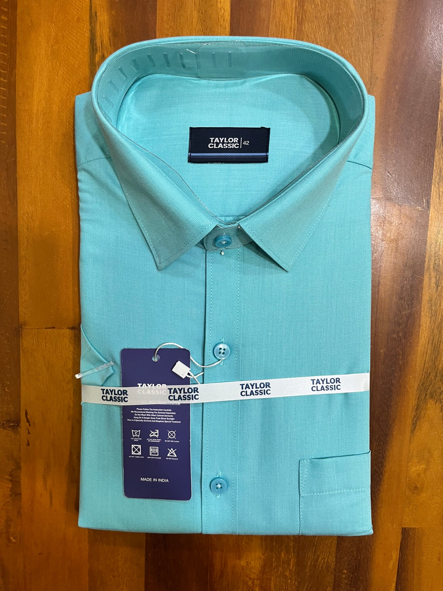 Pure Cotton Turquoise Solid Shirt (42 HS)