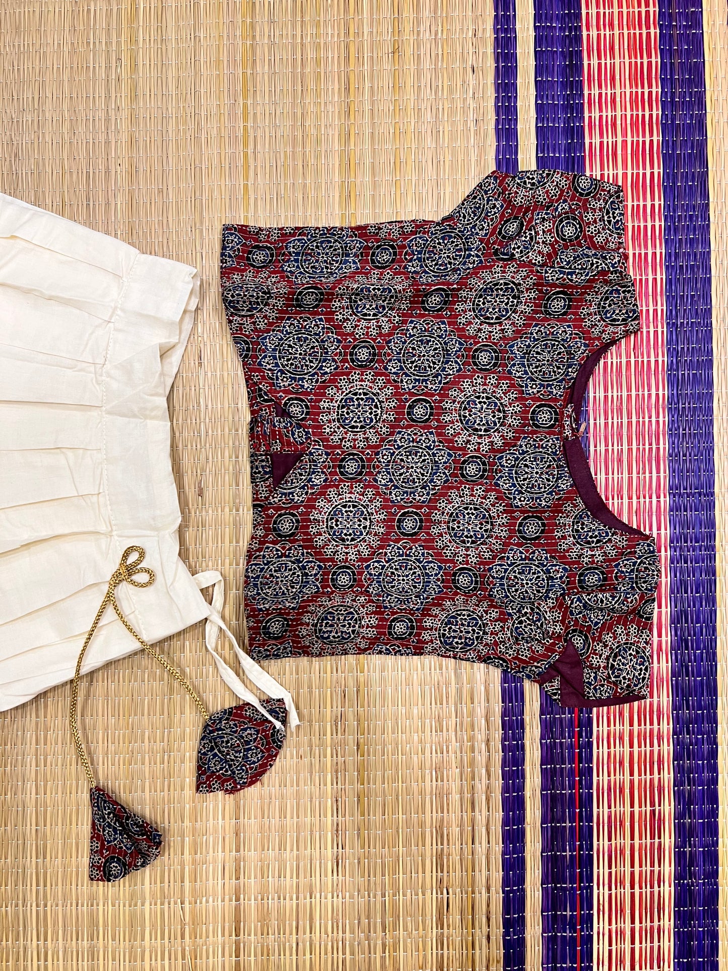 Pure Cotton Maroon Ajrakh Crop Top and Off White Pavada with Kasavu and Printed Border