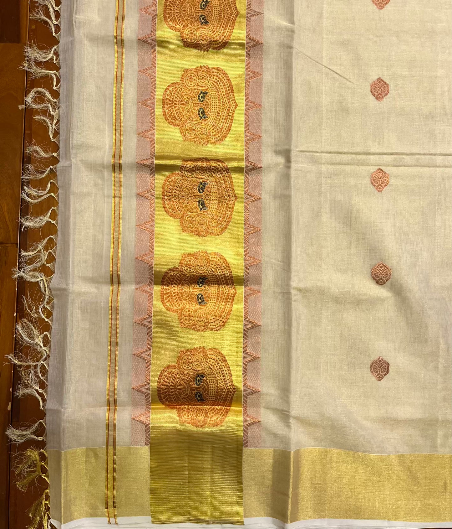 Southloom Premium Handloom Tissue Kasavu Saree with Theyyam Design Woven on Pallu and Border