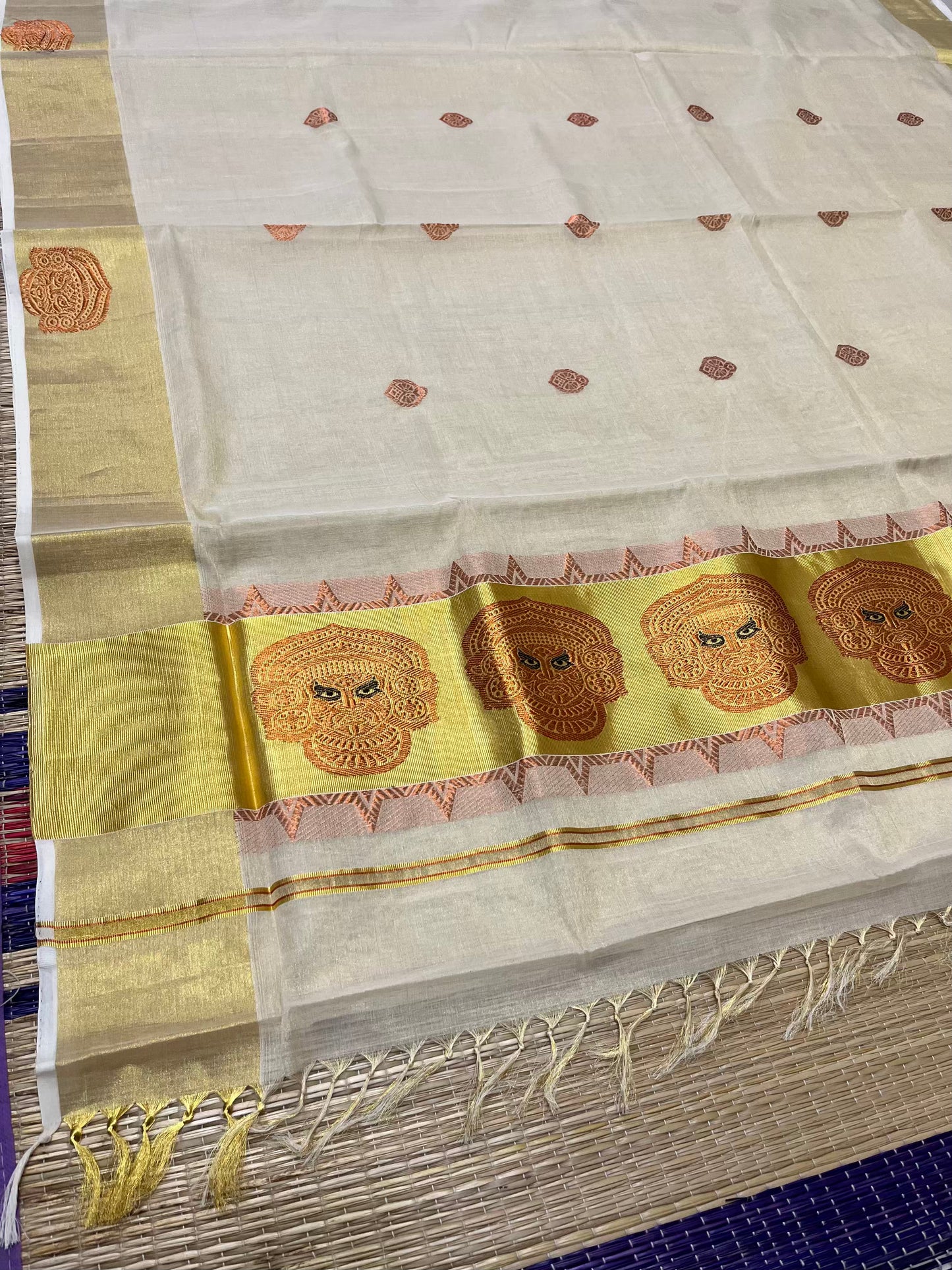 Southloom Premium Handloom Tissue Kasavu Saree with Theyyam Design Woven on Pallu and Border
