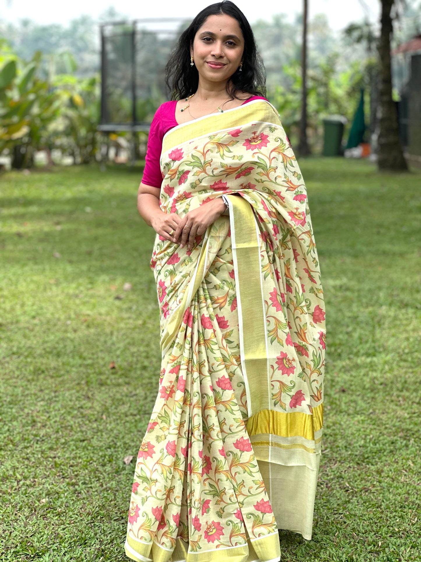 Kerala Tissue Kasavu Saree with Pink Lotus Floral Kalamkari Design