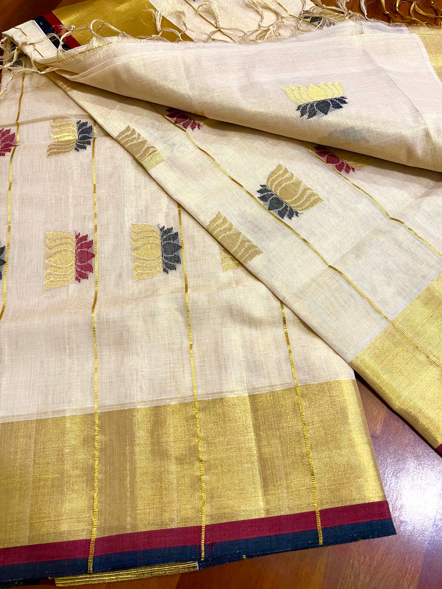Southloom Premium Handloom Tissue Kasavu Saree with Black, Gold and Maroon Lotus Woven Designs