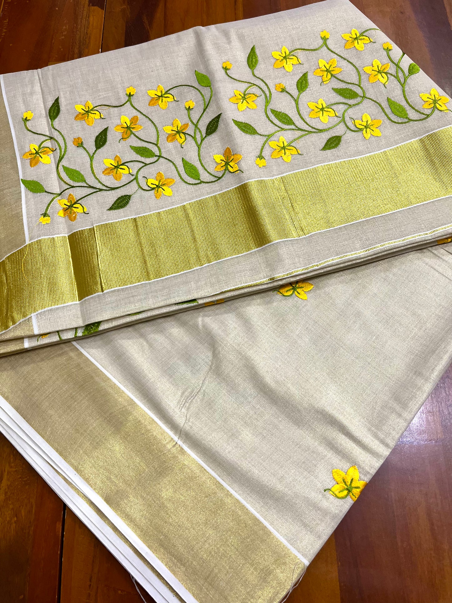Southloom Tissue Cotton Kerala Kasavu Saree with Kanikonna Floral Embroidery on Body