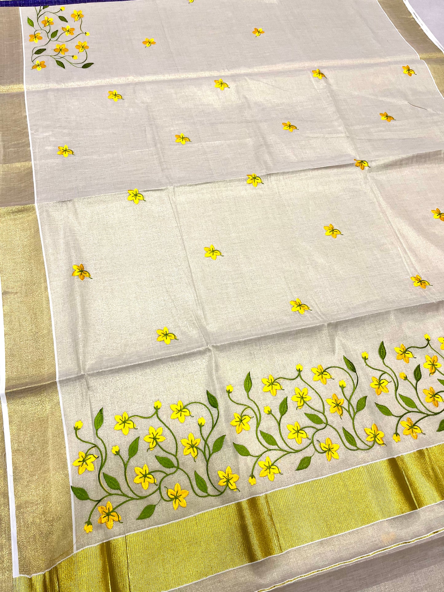 Southloom Tissue Cotton Kerala Kasavu Saree with Kanikonna Floral Embroidery on Body