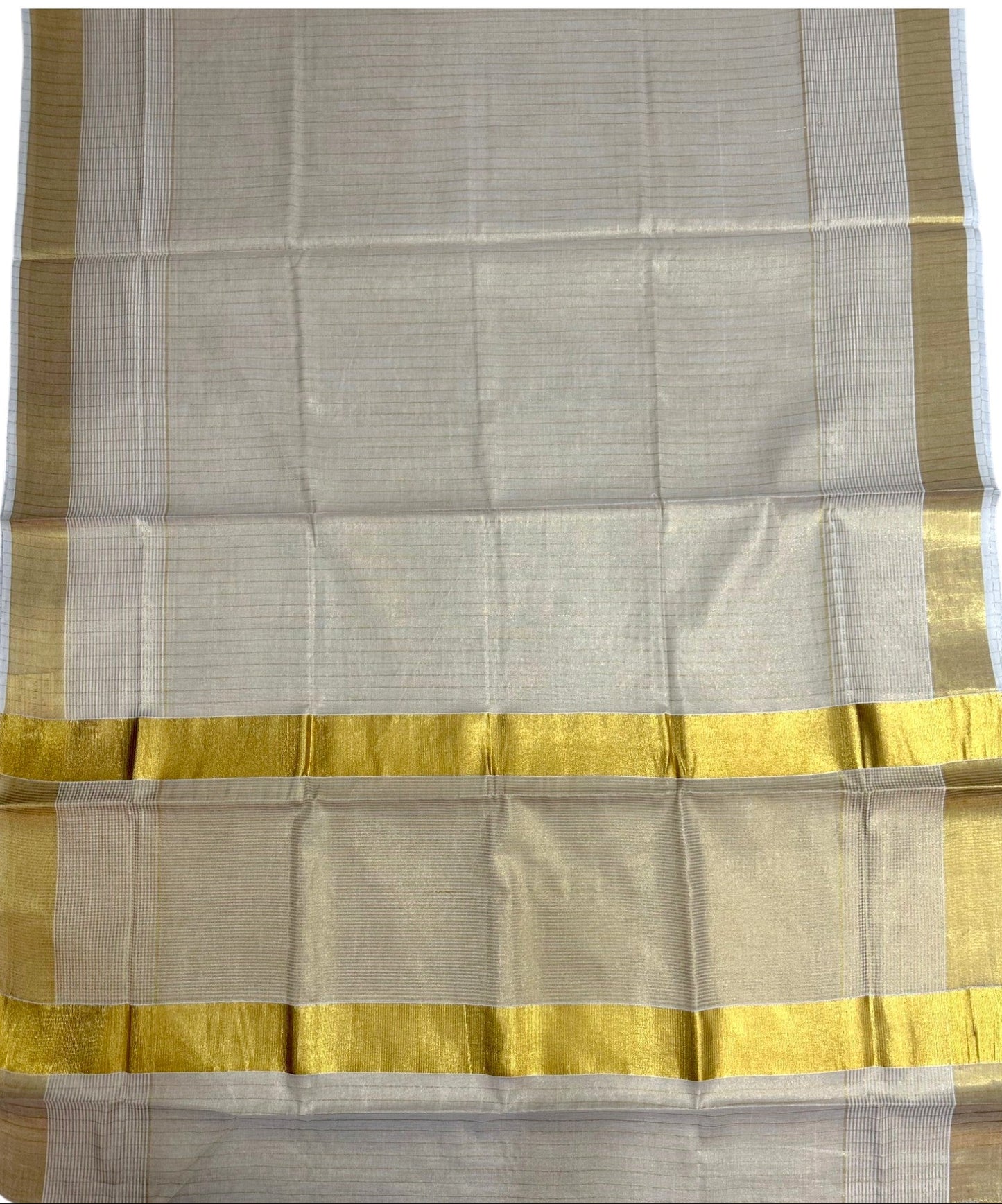 Southloom Kerala Tissue Saree With Lines On The Body With Kasavu Borders