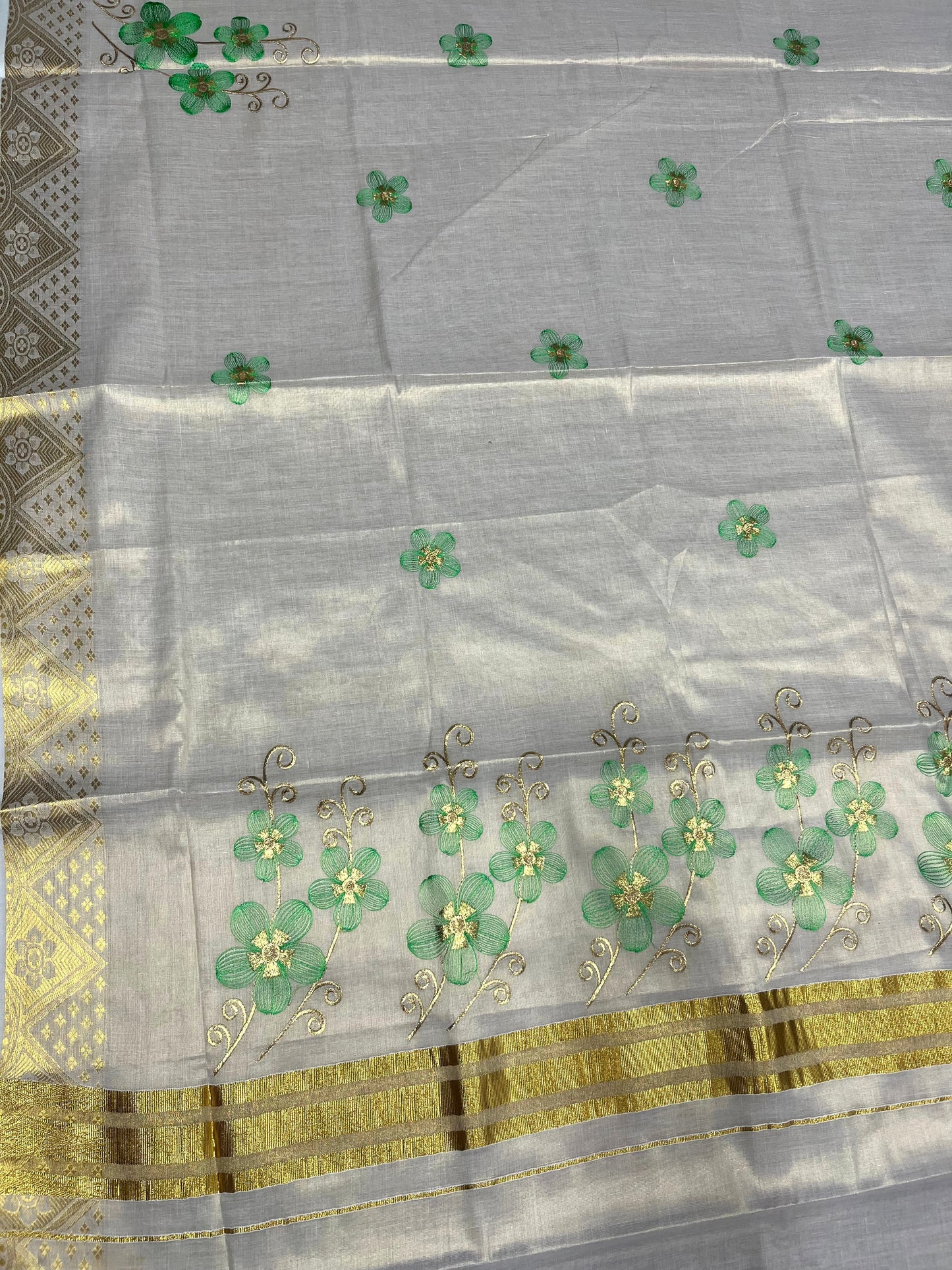 Southloom Kerala Tissue Kasavu Saree with Green Floral Embroidery Work on Body