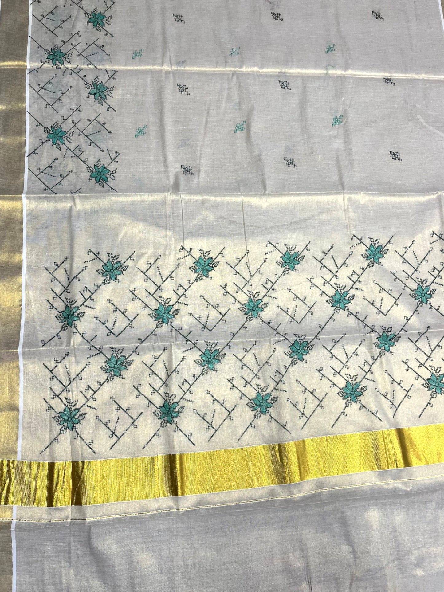 Southloom Tissue Kerala Kasavu Saree with Floral Embroidery Work on Body in Green
