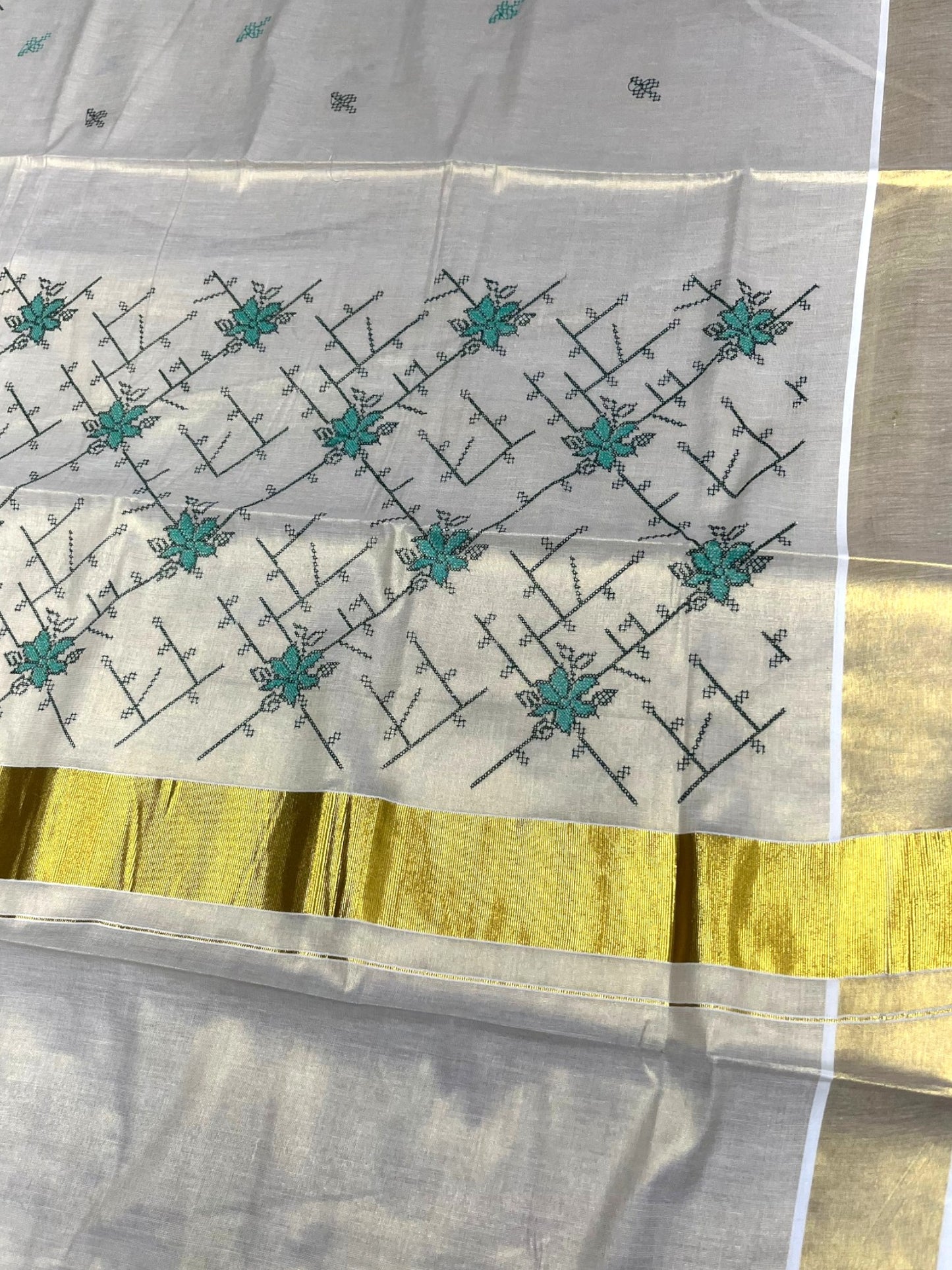 Southloom Tissue Kerala Kasavu Saree with Floral Embroidery Work on Body in Green