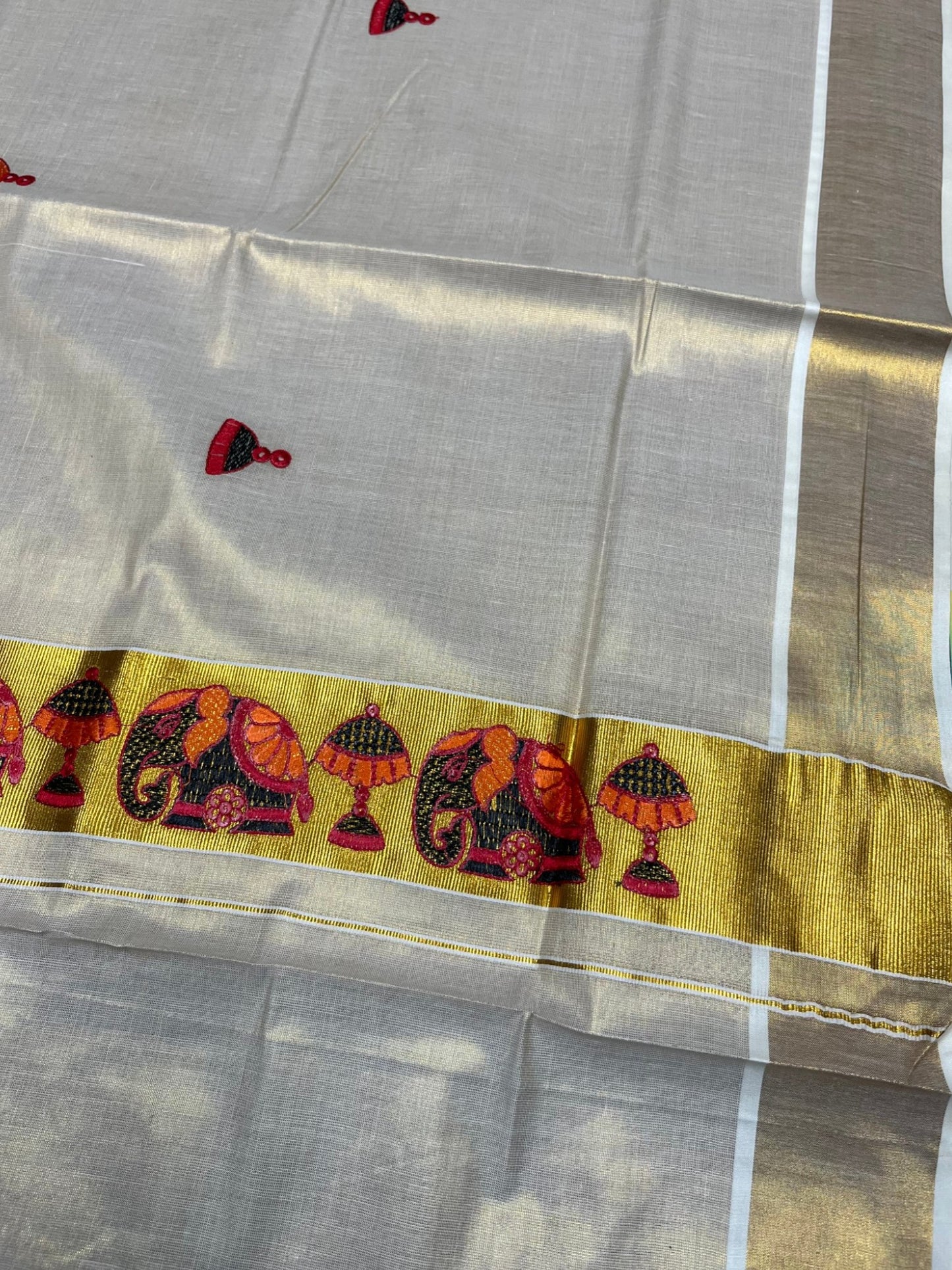 Southloom Tissue Kerala Kasavu Saree with Elephant Embroidery Design