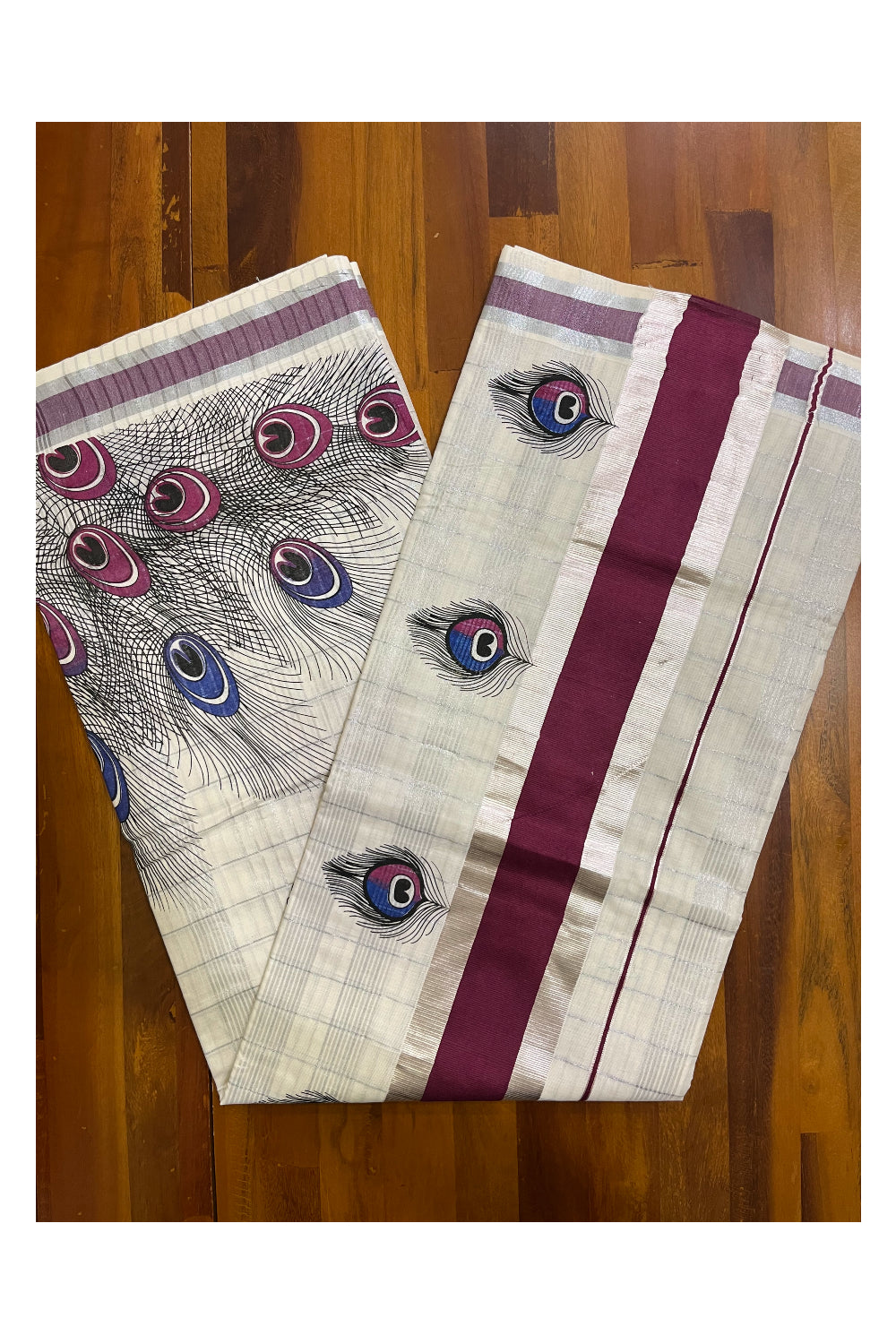 Pure Cotton Kerala Saree with Silver Kasavu Checks and Feather Block Prints on Purple Border