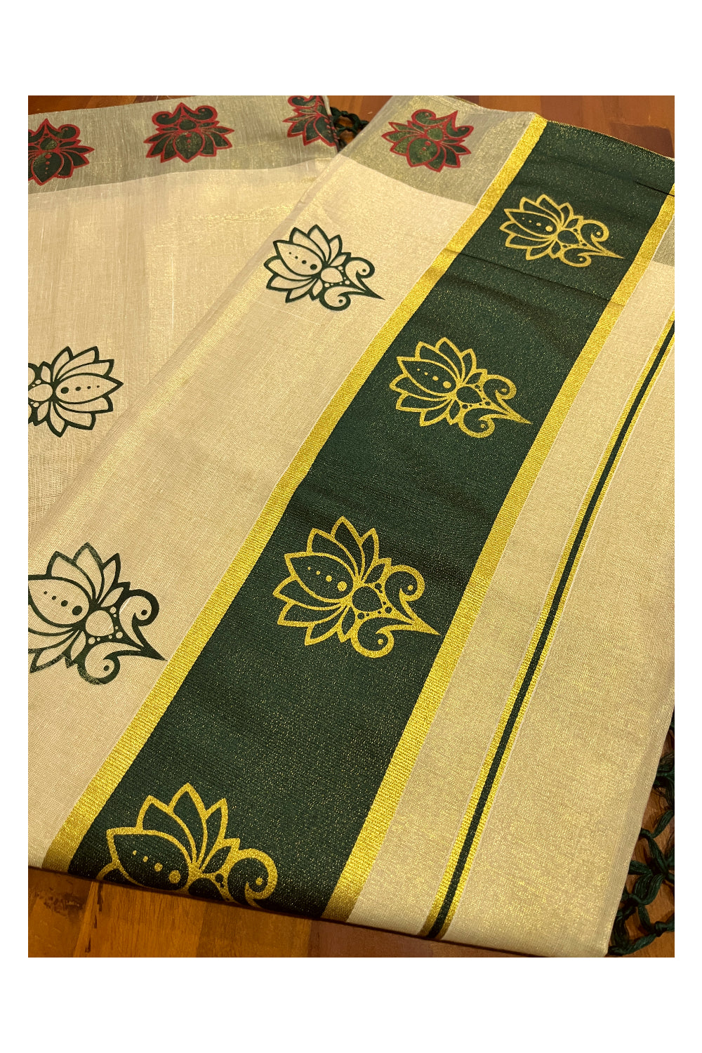 Kerala Tissue Kasavu Saree with Green and Golden Block Prints and Green Border