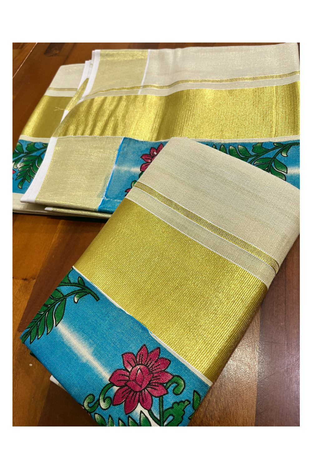 Kerala Tissue Single Set Mundu (Mundum Neriyathum) with Red Floral Block Prints in Blue Border 2.80 Mtrs (Onam 2024 Collection)