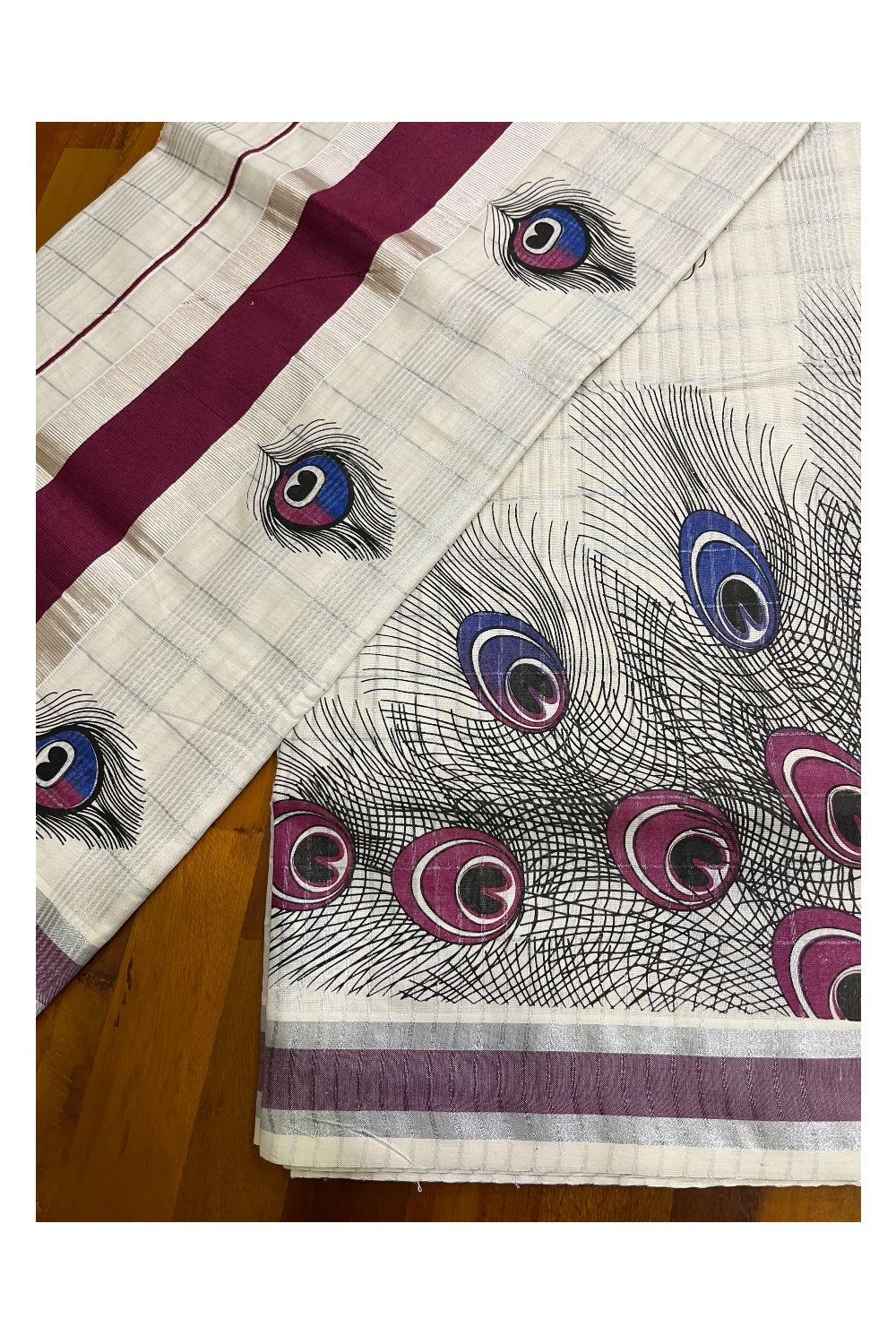 Pure Cotton Kerala Saree with Silver Kasavu Checks and Feather Block Prints on Purple Border