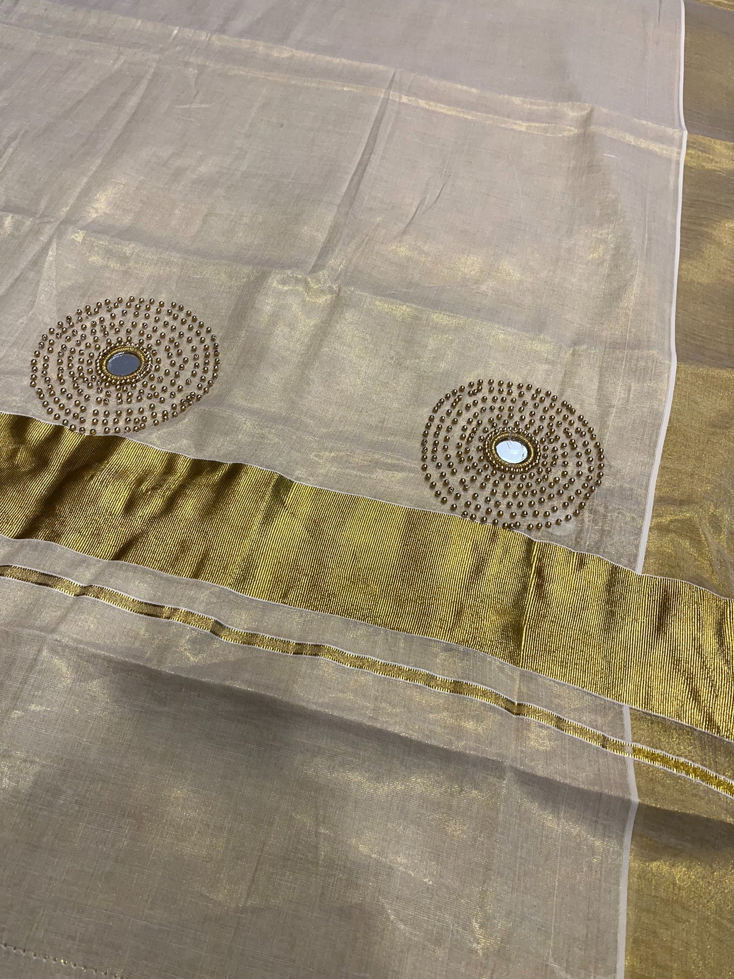 Southloom Tissue Kerala Kasavu Saree with Mirror & Beads Works