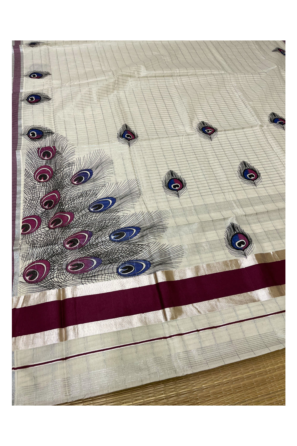 Pure Cotton Kerala Saree with Silver Kasavu Checks and Feather Block Prints on Purple Border