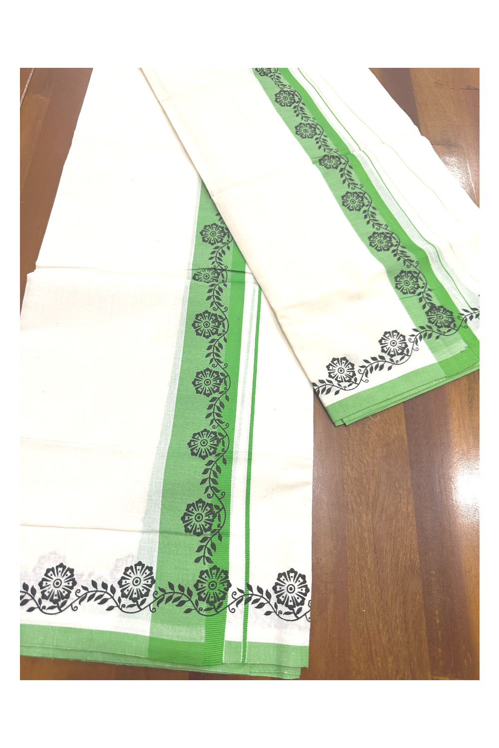 Kerala Cotton Set Mundu (Mundum Neriyathum) with Black Floral Block Prints in Light Green Border (Onam Set Mundu 2023)