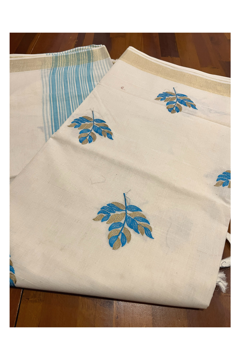 Pure Cotton Kerala Saree with Blue Leaf Embroidery Work and Kasavu Border