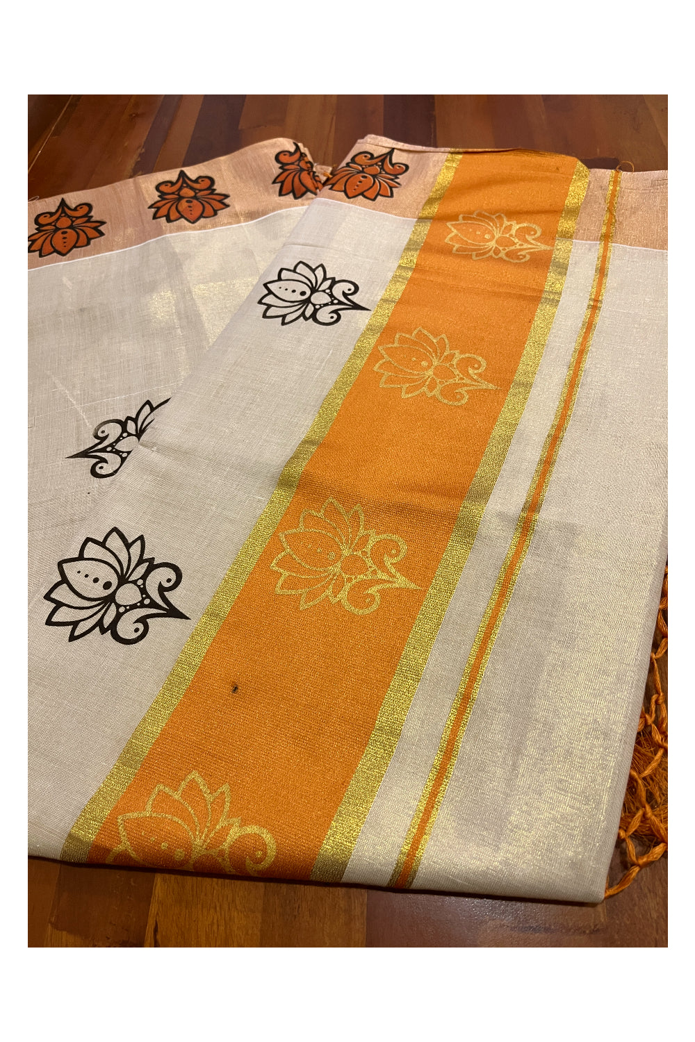 Kerala Tissue Kasavu Saree with Orange and Golden Block Prints and Orange Border