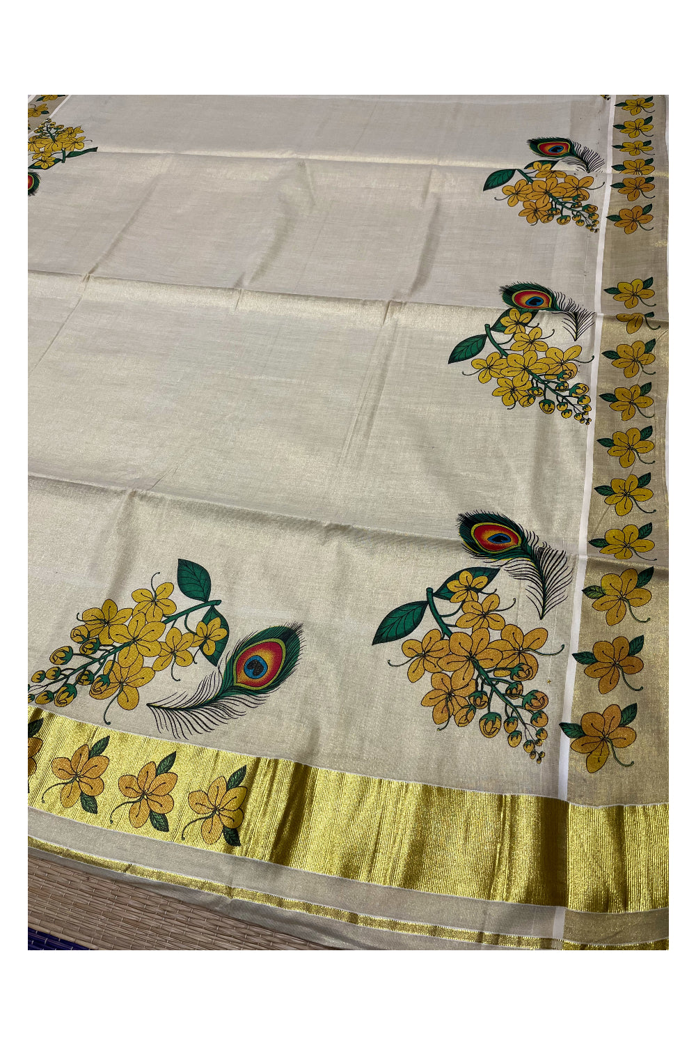 Kerala Tissue Kasavu Saree with Feather and Floral Mural Printed Designs