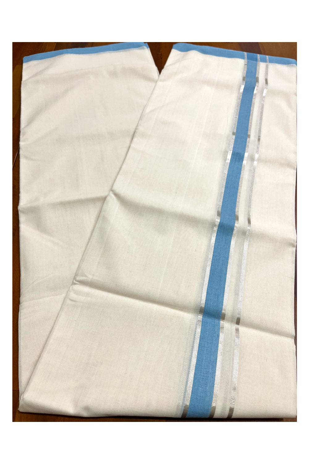 Premium Balaramapuram Handloom Unakkupaavu Cotton Double Mundu with Light Blue and Silver Kasavu Border (Vishu 2024 Collection)