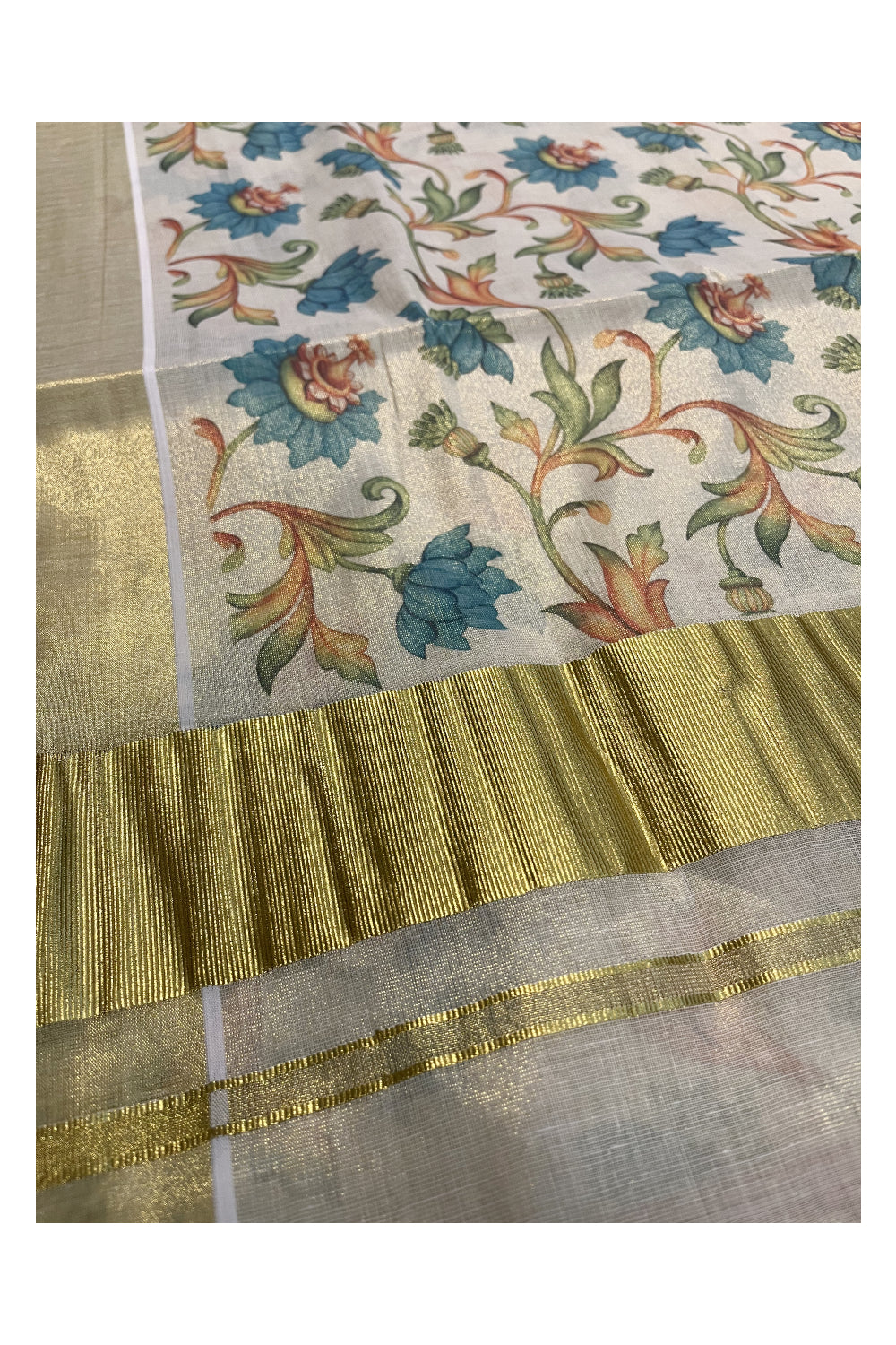 Kerala Tissue Kasavu Saree with Blue Floral Kalamkari Design