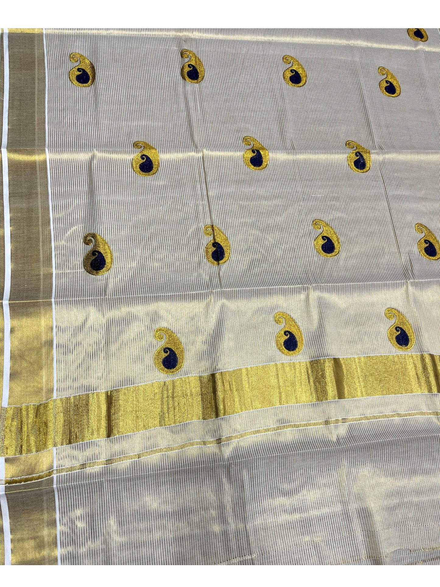 Southloom Kerala Tissue Kasavu Saree with Blue Embroidery Design