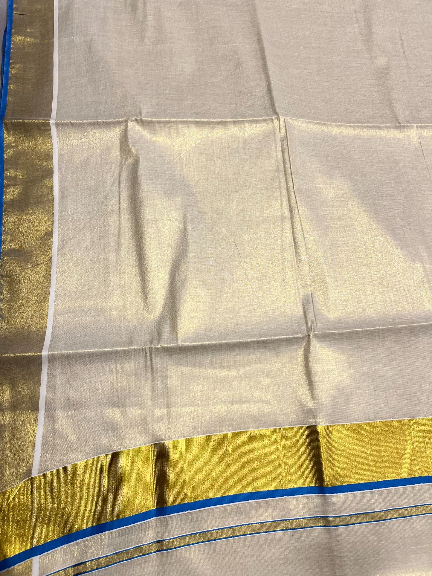 Southloom Kerala Tissue Kasavu Plain Saree With Blue Border