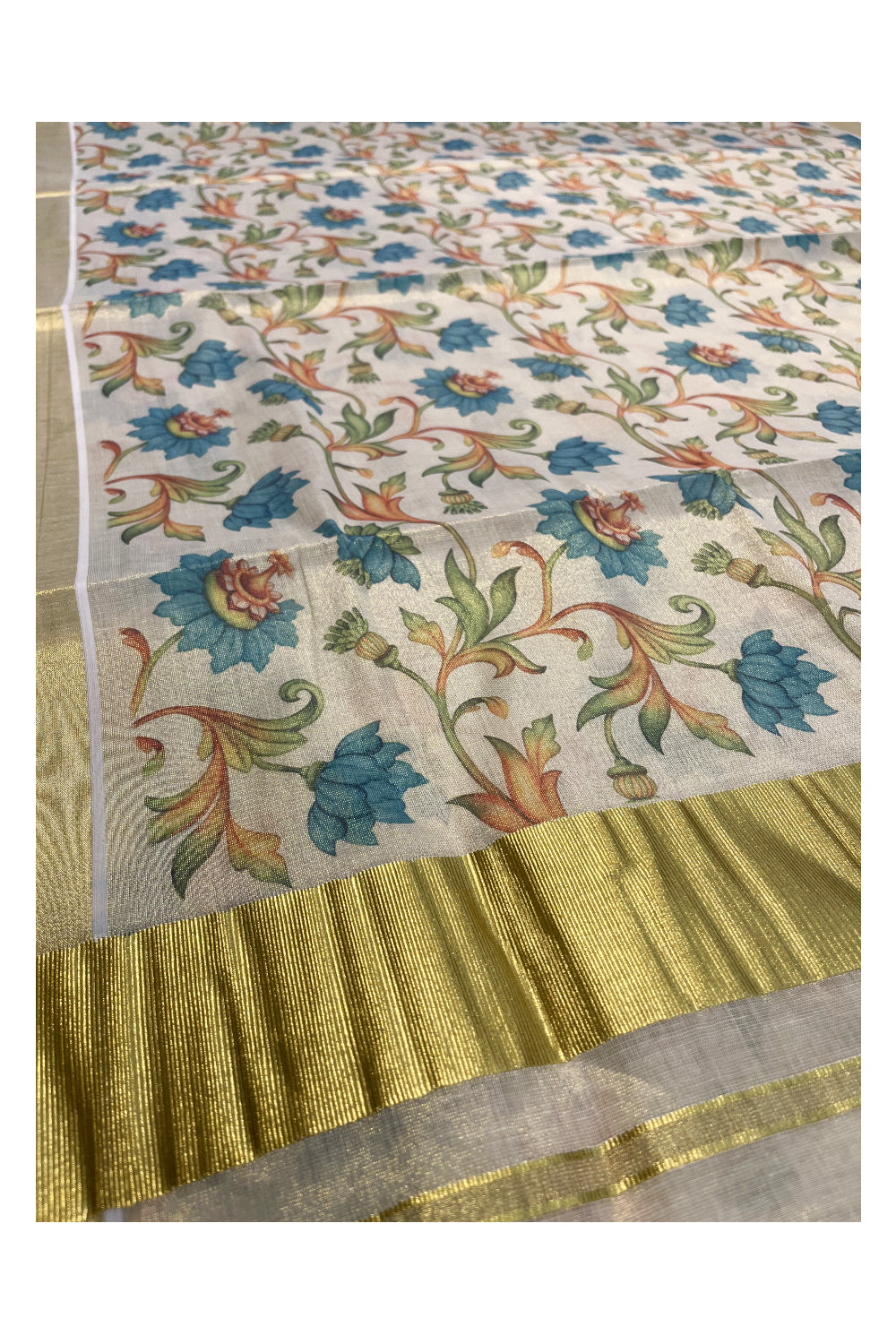 Kerala Tissue Kasavu Saree with Blue Floral Kalamkari Design