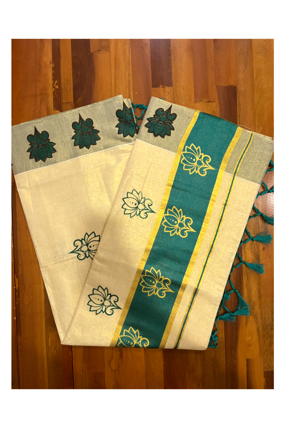 Kerala Tissue Kasavu Saree with Green and Golden Block Prints and Green Border