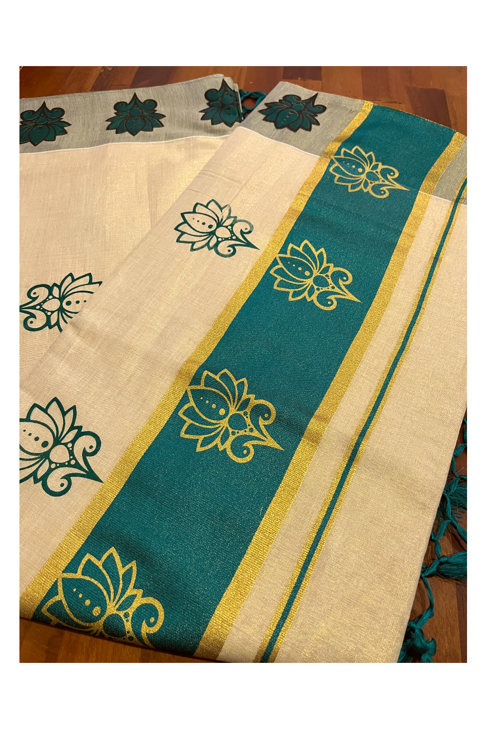 Kerala Tissue Kasavu Saree with Green and Golden Block Prints and Green Border