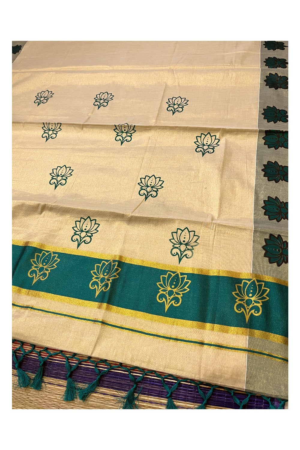 Kerala Tissue Kasavu Saree with Green and Golden Block Prints and Green Border