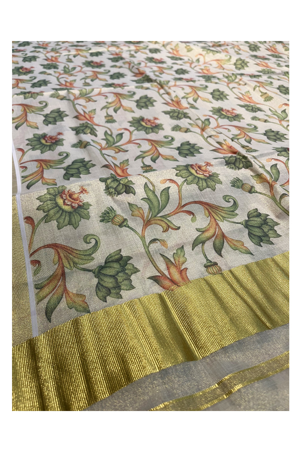 Kerala Tissue Kasavu Saree with Green Floral Kalamkari Design