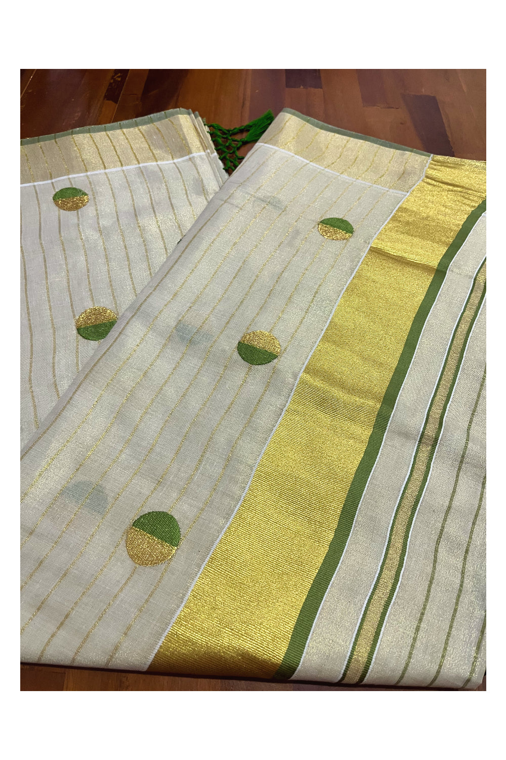 Kerala Tissue Kasavu Saree with Kasavu Lines Across Body and Olive Green Semi Polka Woven Designs