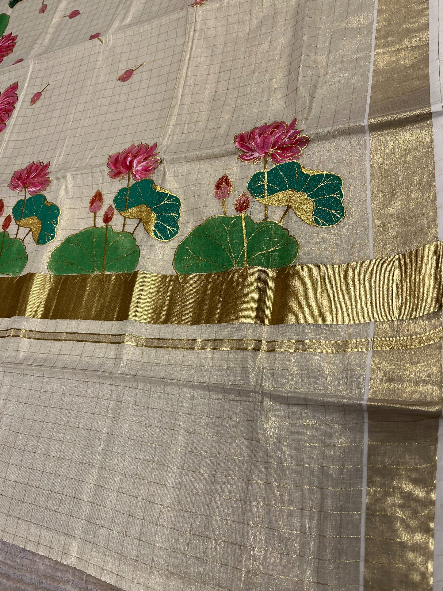 Southloom Tissue Kerala Kasavu Saree with Check Hand Painted Embroidery Lotus Design