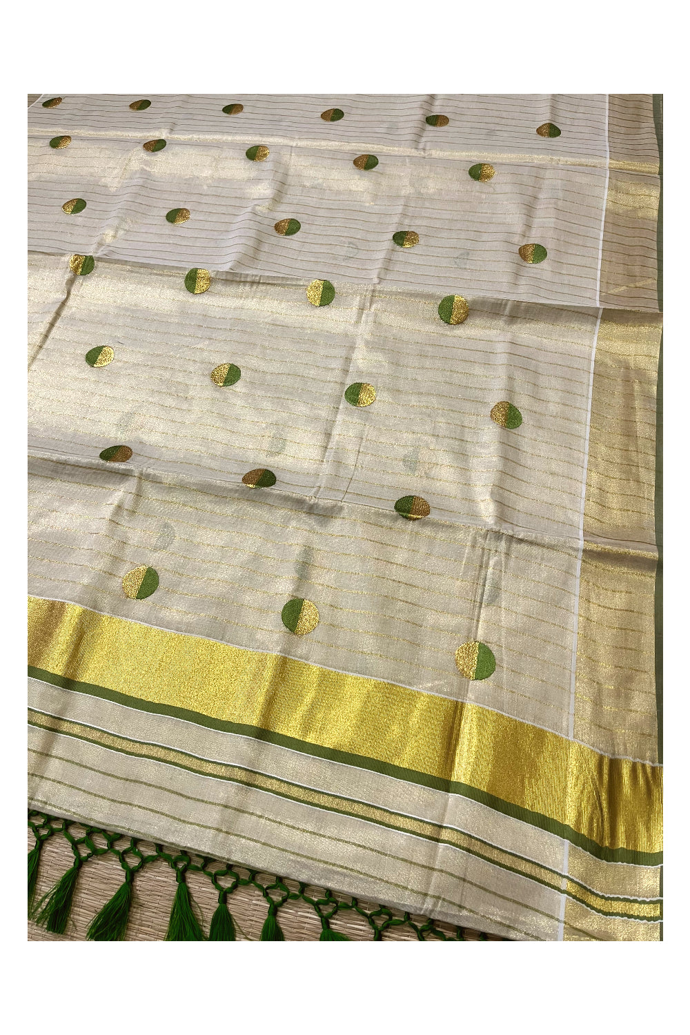 Kerala Tissue Kasavu Saree with Kasavu Lines Across Body and Olive Green Semi Polka Woven Designs