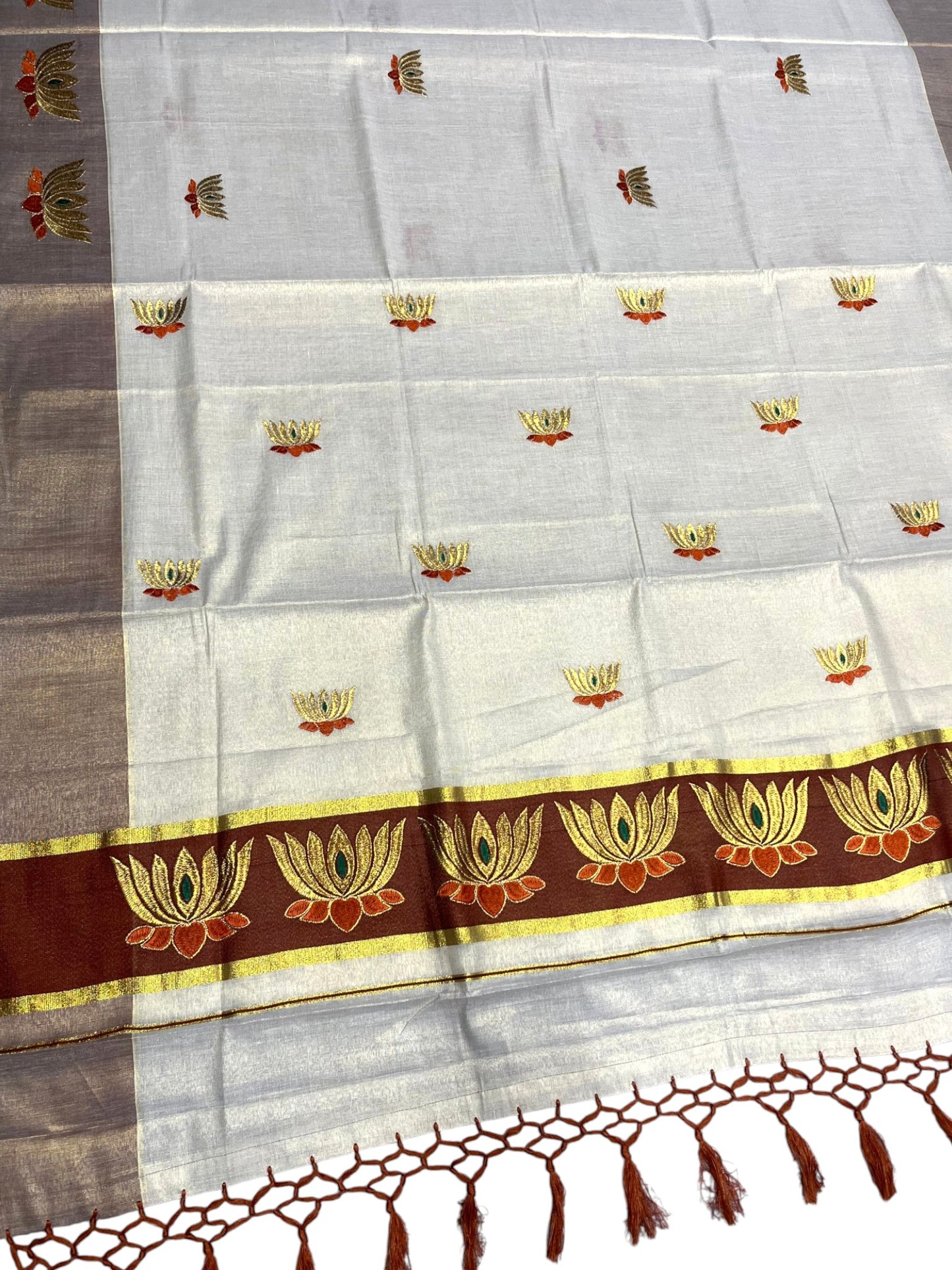 Southloom Kerala Tissue Kasavu Saree with Brown And Golden Lotus Embroidary Works on Body SL273