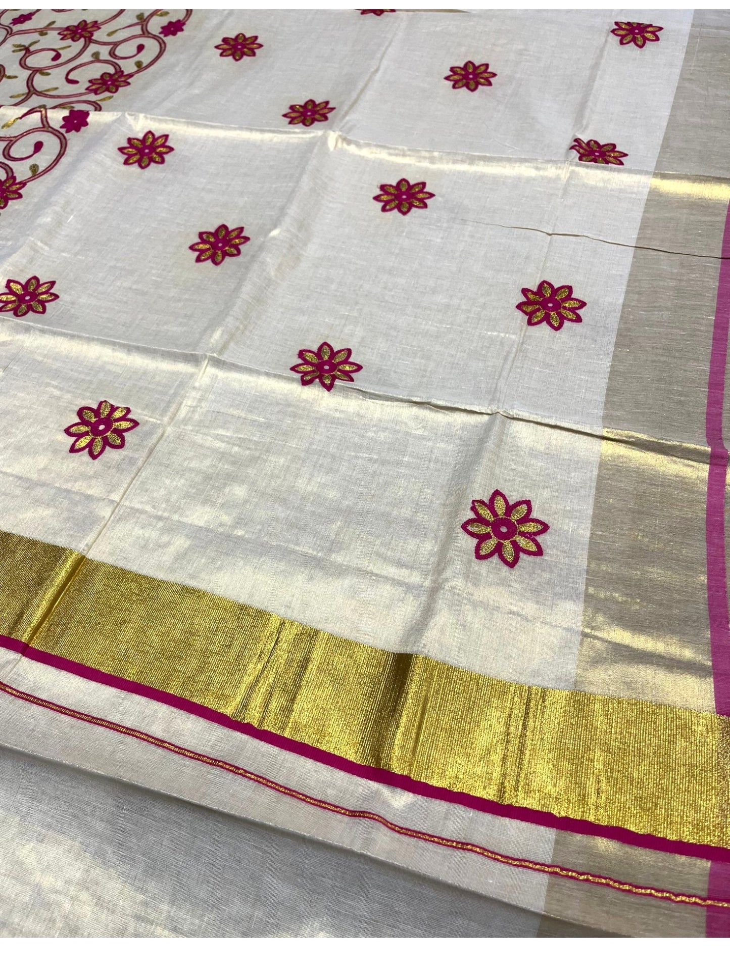 Southloom Kerala Tissue Kasavu Saree With Magenta and Golden Floral Embroidery Works
